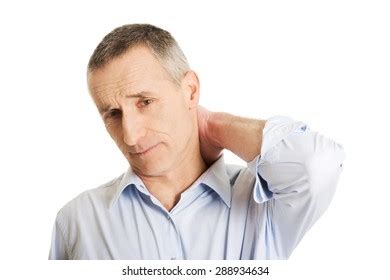 Mature Man Suffering Neck Pain Stock Photo 288934634 Shutterstock