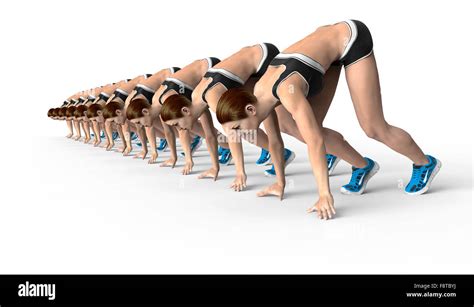 Athletic Women In Crouched Starting Position Ready To Start Race