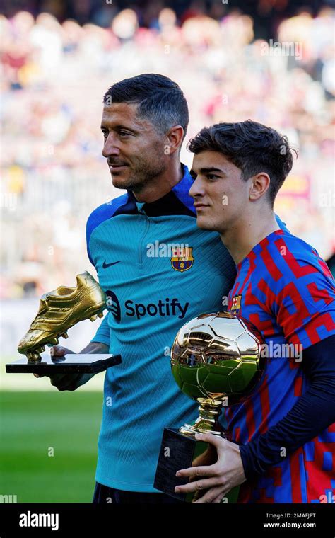 BARCELONA - DEC 31: Lewandowski and Gavi show their trophies prior to ...