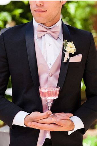 Groom Is Wearing The Lorenzo Tuxedo Complete With Blush Pink Champagne