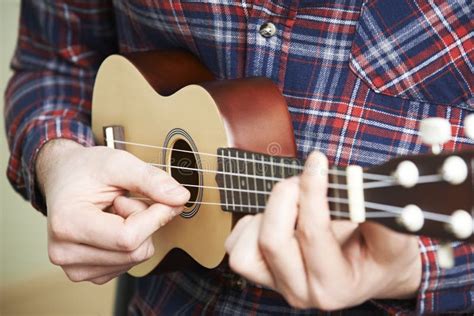 Close Up Of Man Playing Ukulele Stock Photo Image Of Horizontal