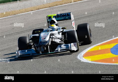 Nico Rosberg Driving The Mercedes Mgp W Formula Race Car In