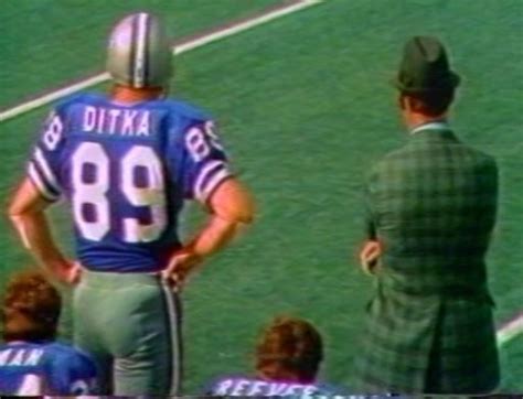 Tight End Mike Ditka 89 And Head Coach Tom Landry Watch The Action