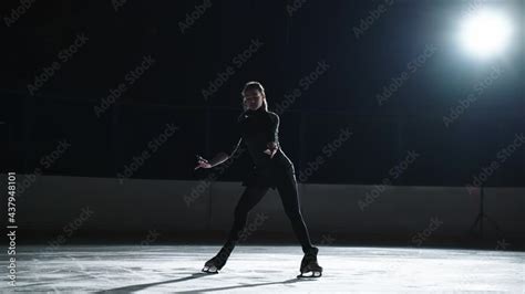 Female Artistic Figure Skater Is Performing A Woman S Single Skating Choreography On Ice Rink