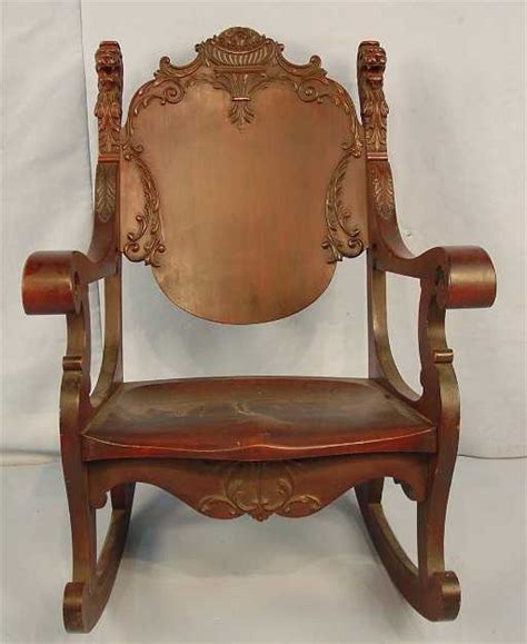 Heavily Carved Mahogany Rocking Chair With Lions Heads