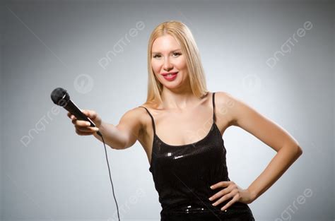 Woman Singing In Karaoke Club Photo Background And Picture For Free