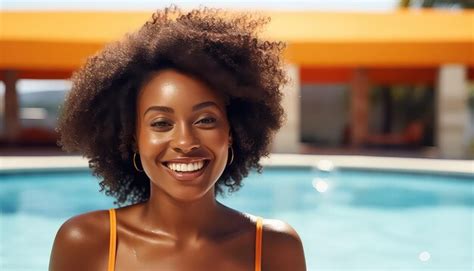 Premium AI Image Black Woman With Afro Curls In Orange Bikini By The