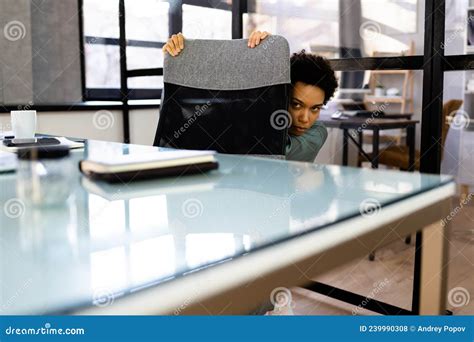 Scared Female Hiding Under Desk Stock Photo Image Of Afraid Edge