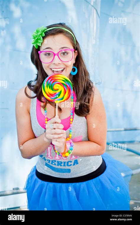 teen girl with large lollipop Stock Photo - Alamy