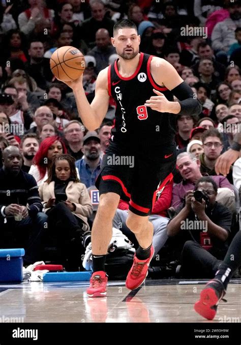 Chicago Bulls Center Nikola Vucevic Looks To Pass During An NBA