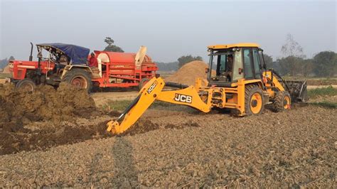 Jcb Backhoe Machine Making Drain And Working For Road Construction