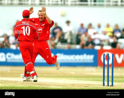 Lancashire Bowler Chris Schofield Celebrates With Wicket Keeper Warren