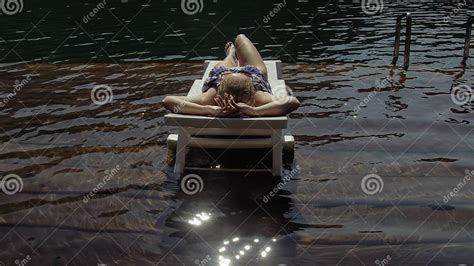 Woman Lie On A Sunbed In Sunglasses And A Boho Silk Shawl Girl Rest On