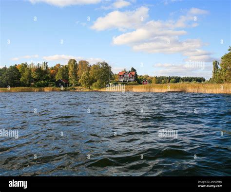 Villa by lake Båven in Södermanland at late summer landscape Stock Photo - Alamy