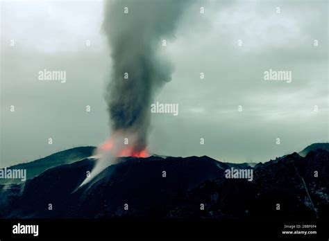 Ash clouds rising from active Ibu Volcano, Halmahera, Indonesia Stock ...