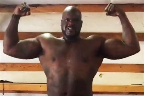 Shaquille O Neal 51 Rips Off His Shirt Flexes His Muscles In