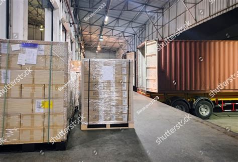 Cargo Shipment Loading For Truck Stacked Of Package Boxes Wrapping