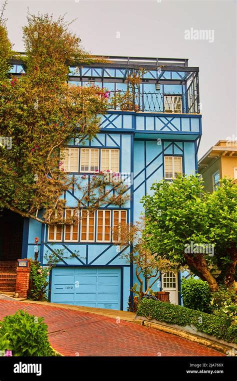 Front Of Stunning Blue West Coast Home On Lombard Streets Red Brick