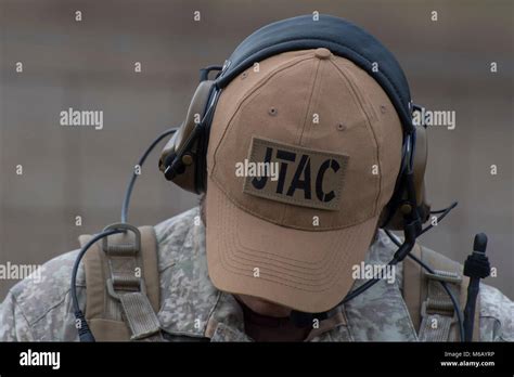 A New Zealand Army Joint Terminal Attack Controller Wears A Hat To