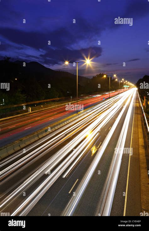 traffic on highway at night Stock Photo - Alamy