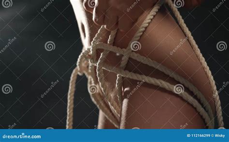 Shibari Master Tying Rope Patterns On A Nude Girl Stock Video Video