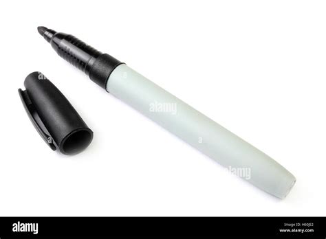 Black marker pen with cap off on a white background Stock Photo - Alamy