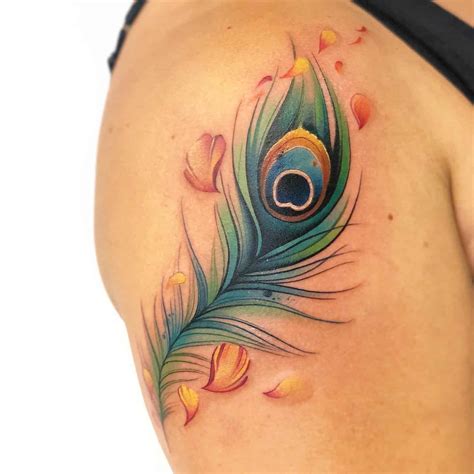 14 Beautiful Peacock Feather Tattoo Ideas For Women In 2024