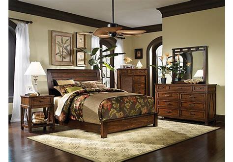 A Bedroom Scene With Focus On The Bed And Dresser