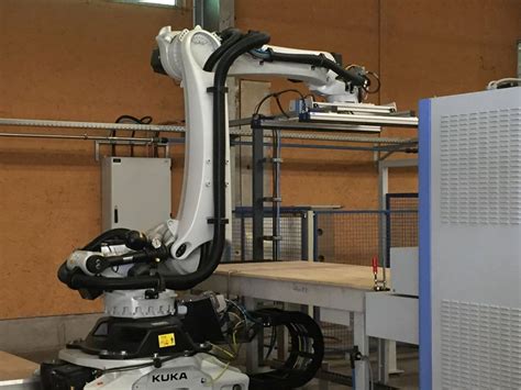 Kuka Robot Tends Wood Processing Machines In The Wood Industry Kuka Ag