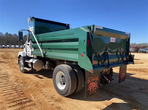 2023 MACK MD642-4R Dump Truck - J.M. Wood Auction Company, Inc.