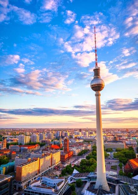 Premium Photo Communications Tower In City Against Sky