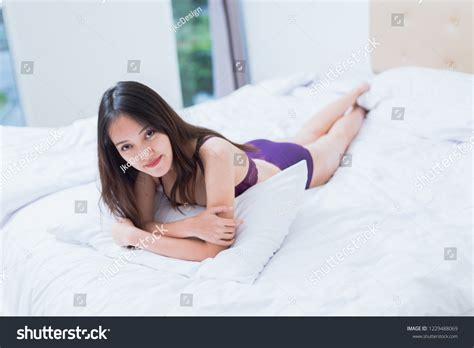 Sexy Asian Woman Purple Lingerie Lying Stock Photo Shutterstock