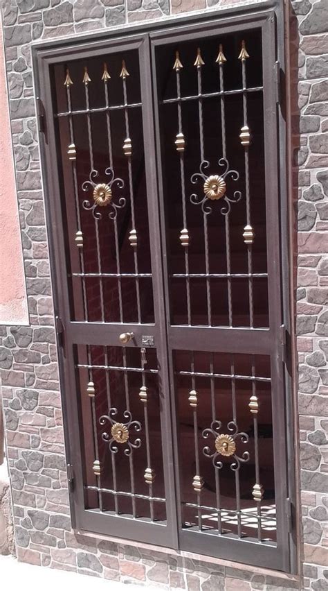 Iron Door With Gold Knobs And Bars