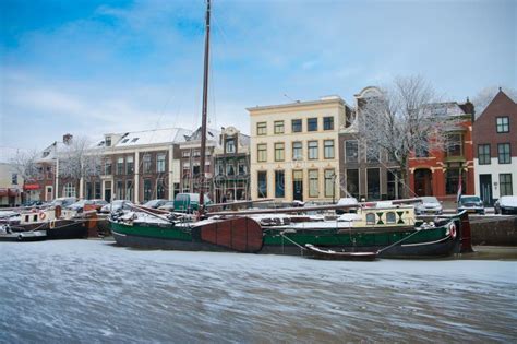 Winter Snow View of a Dutch Canal in Amsterdam Stock Photo - Image of ...