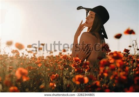 Naked Girl Behind Black Hat Poppy Stock Photo Shutterstock