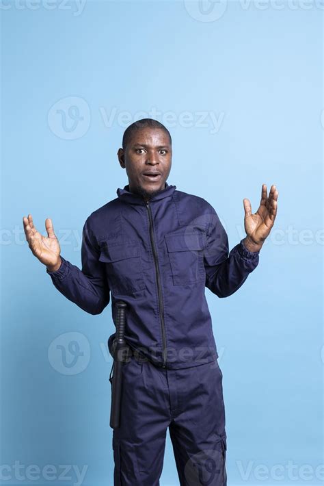 African american officer with uniform acting surprised on camera