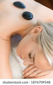 Woman Enjoying Hot Stone Massage Stock Photo 1876709548 Shutterstock