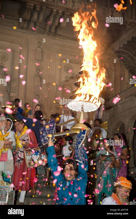 Priest performing aarti, keshi ghat, mathura, uttar pradesh, india ...