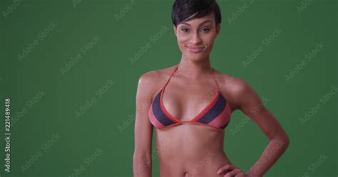 Sexy Black Woman In Bikini Posing On Green Screen Stock Photo Adobe Stock