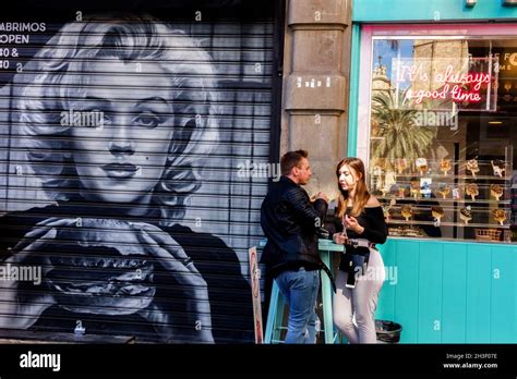 Graffiti Valencia Street Art Spain Couple Outside A Bar In Old Town