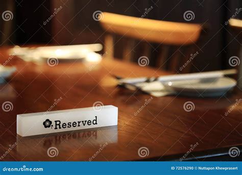 Lighting Reserved Sign On A Restaurant Table Stock Photo Image Of