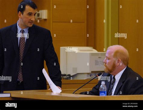 Defense witness John Polster, right, is cross examined by assistant District Attorney David ...