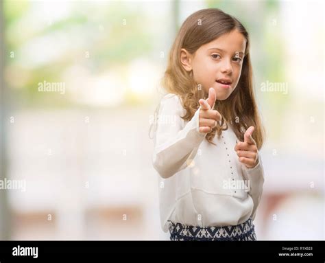 Brunette Hispanic Girl Pointing Fingers To Camera With Happy And Funny Face Good Energy And
