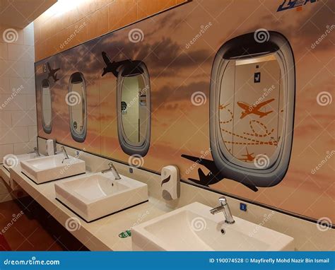 Toilet In The Malaysia International Airport Designed As Plane Window