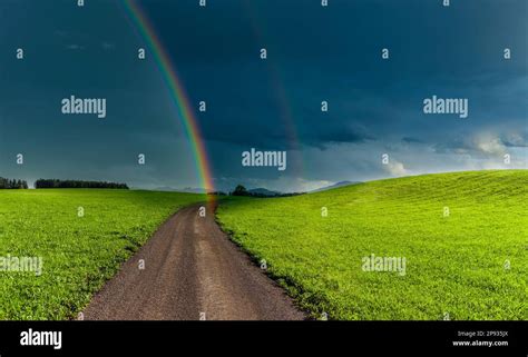 Road Through Green Hilly Landscape Stock Photo Alamy