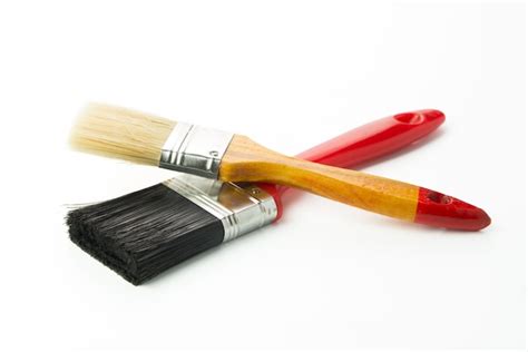 Premium Photo | Two paint brushes