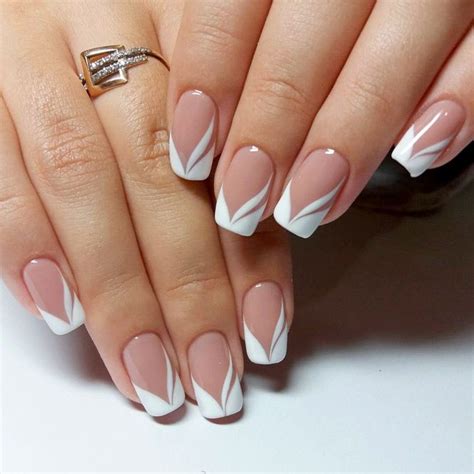 Designs Of French Manicure Are Much More Intricate This Season Click