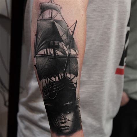 Vintage Style Black And White Sailing Ship Tattoo On Forearm With