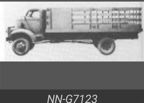 An Old Black And White Photo Of A Truck With The Words Nn G