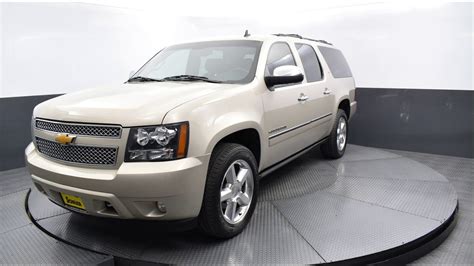 2014 Champagne Silver Metallic Chevrolet Suburban 1500 4d Sport Utility